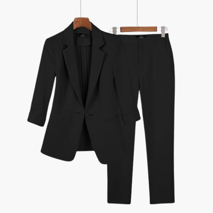 Kvinnors kostymset med blazer och byxor