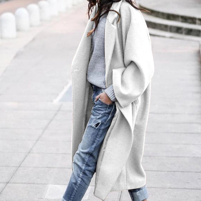 Tyra | Lång oversize kappa med slagkrage och fickor