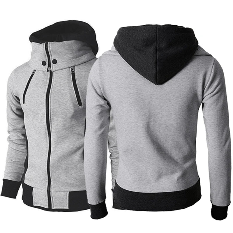 Man i smal grå sweatjacka med hög krage