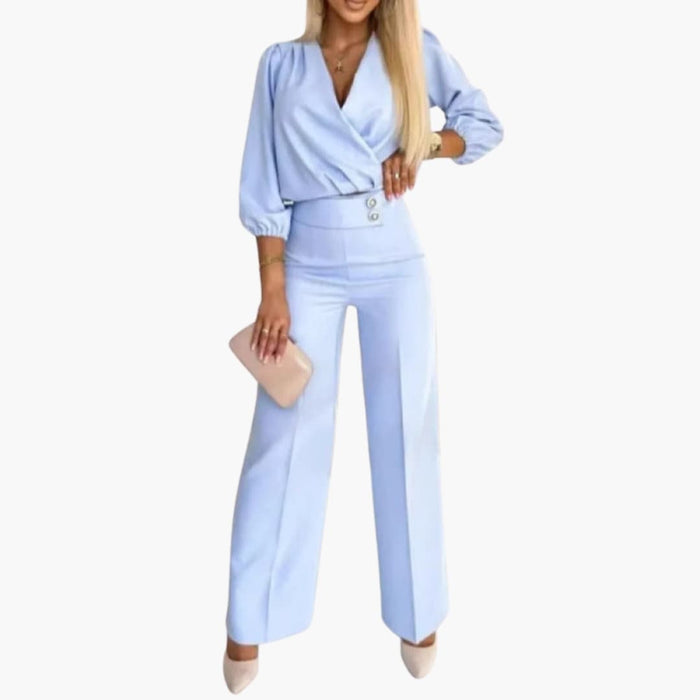 Kvinnors V-ringad Jumpsuit med Vida Ben